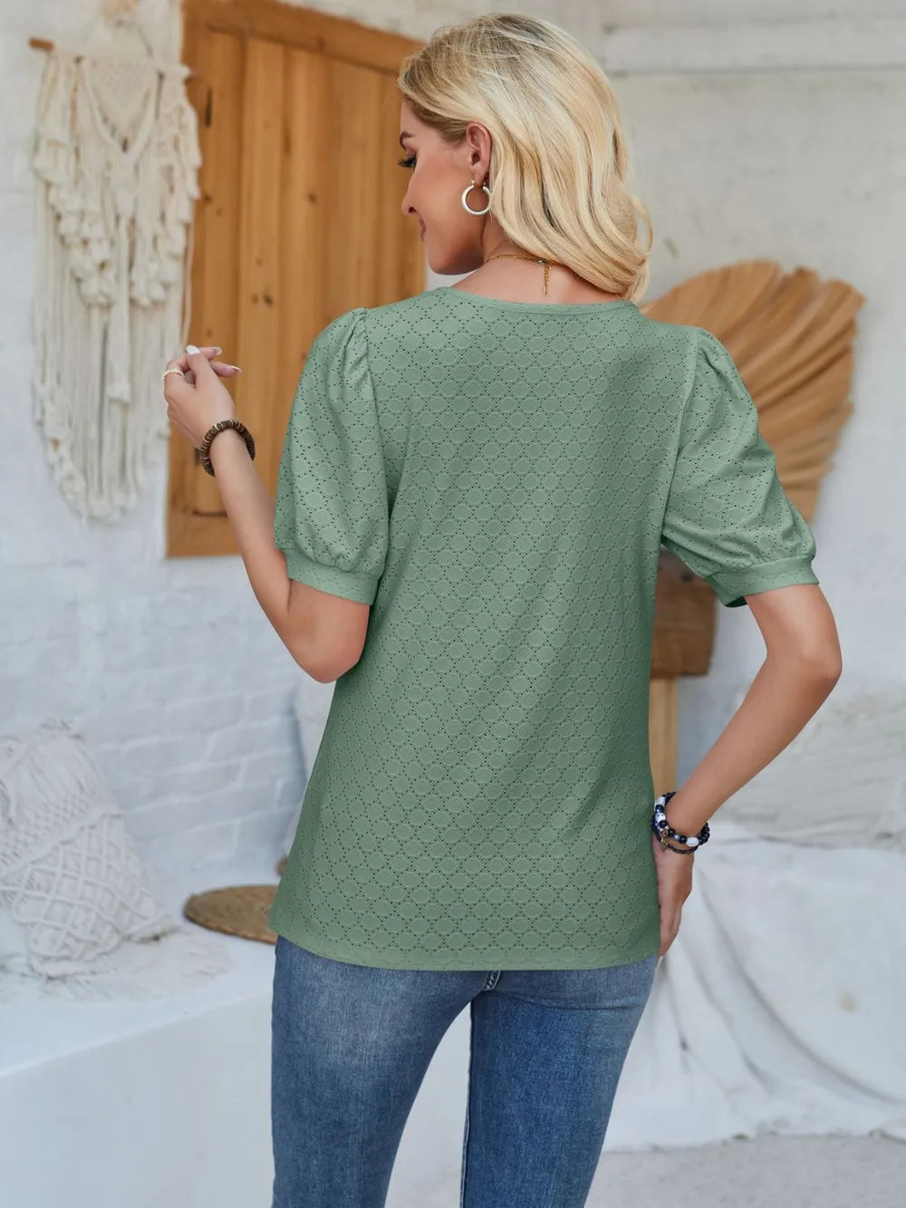 Plush Fashion Hub eyelet asymmetrical neck short sleeve T-shirt, casual tops with unique neckline and comfortable fit.