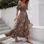 Women’s paisley one-shoulder maxi dress by Plush Fashion Hub, flowing casualwear with a stylish one-shoulder design and vibrant pattern.