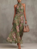 Full size floral print sleeveless maxi dress by Trendsi, featuring a vibrant floral pattern and flowing silhouette.