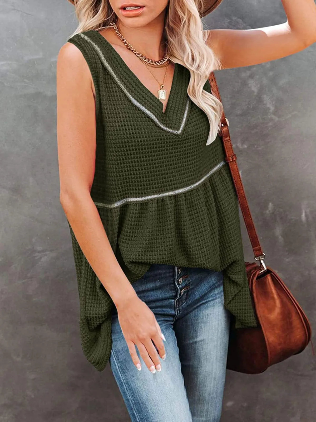 V-neck waffle knit tank top with contrast stitching from Plush Fashion Hub, featuring a fitted sleeveless design and textured fabric.