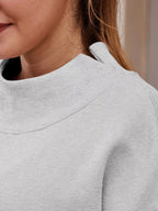 Women's oversized mock neck sweatshirt with dropped shoulders, casual fit, in soft fabric, by Trendsi.