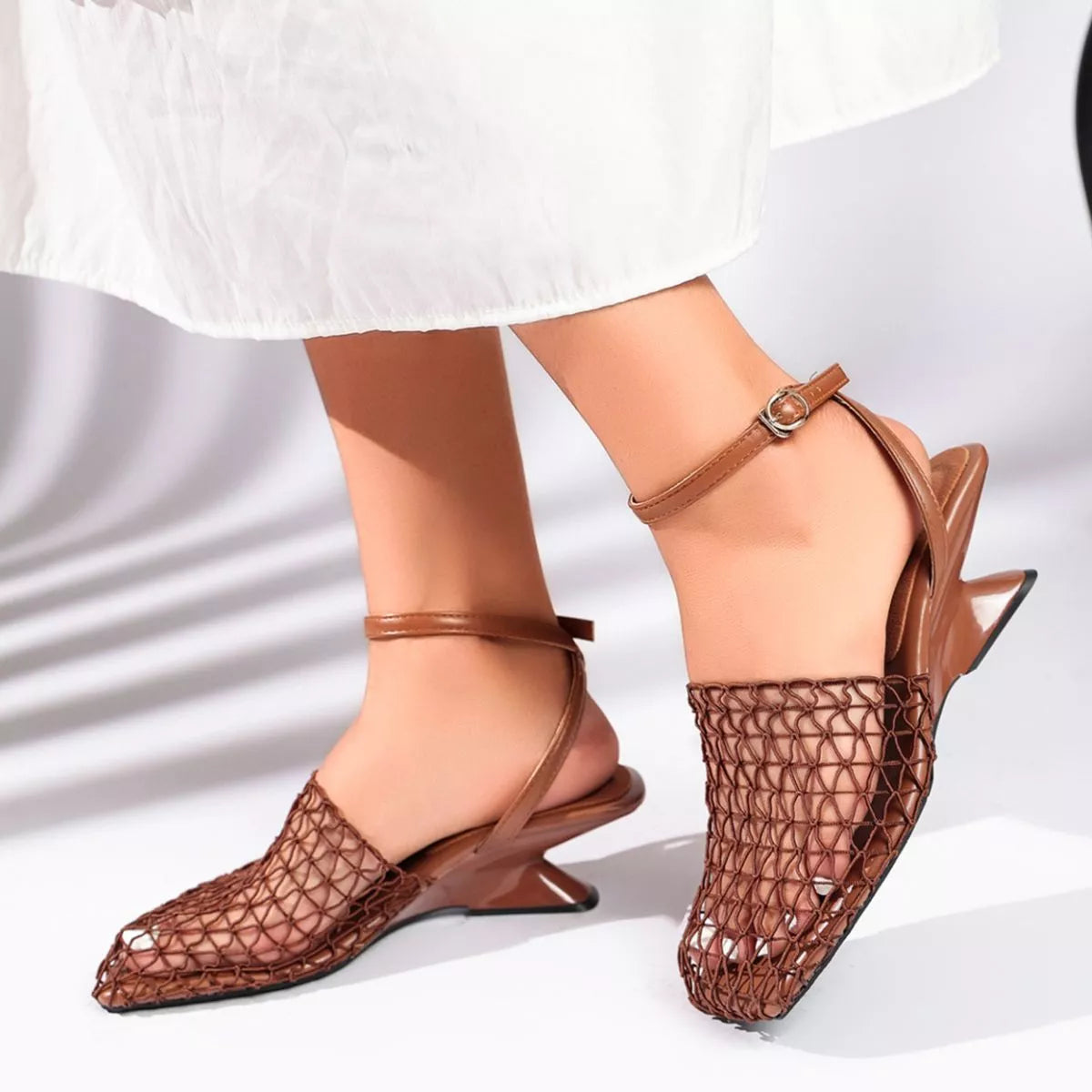 Shopimist ankle strap heeled sandals with open toe design, showcasing stylish straps and high heels on a white background.