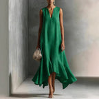 Women's deep V-neck sleeveless asymmetrical patchwork maxi dress by FitiqueFit, featuring a flowing silhouette and stylish design.