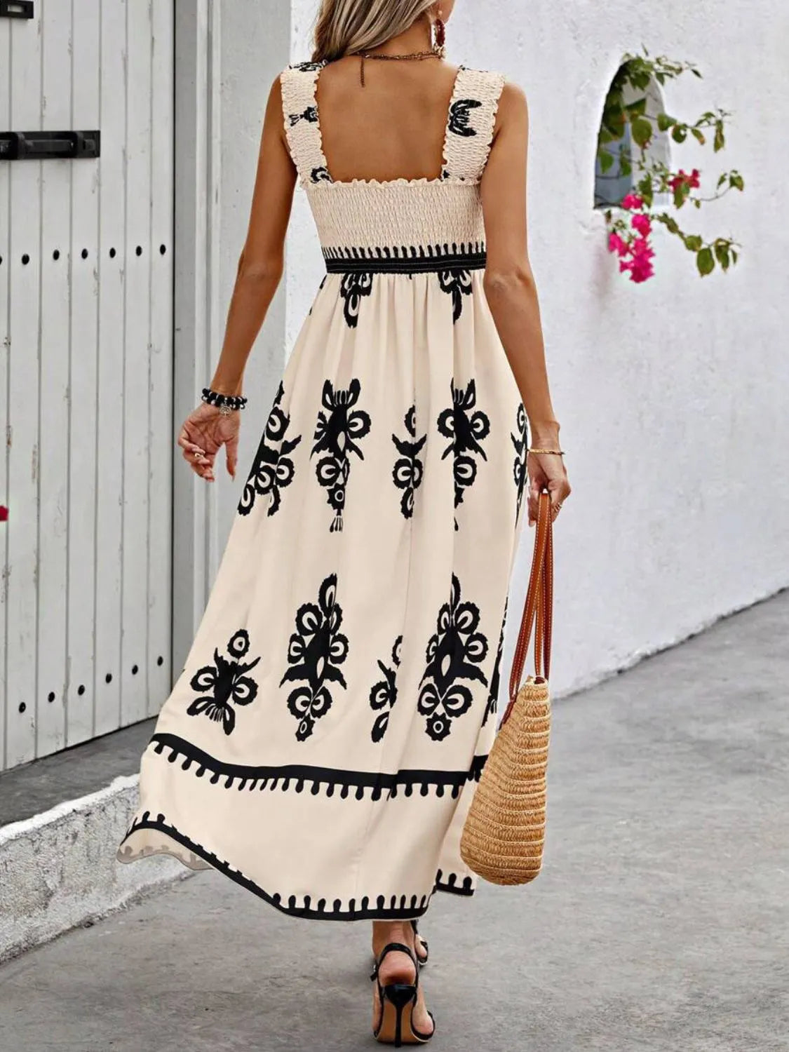 Smocked printed wide strap maxi dress by Plush Fashion Hub, flowing design with vibrant floral patterns and a relaxed fit.