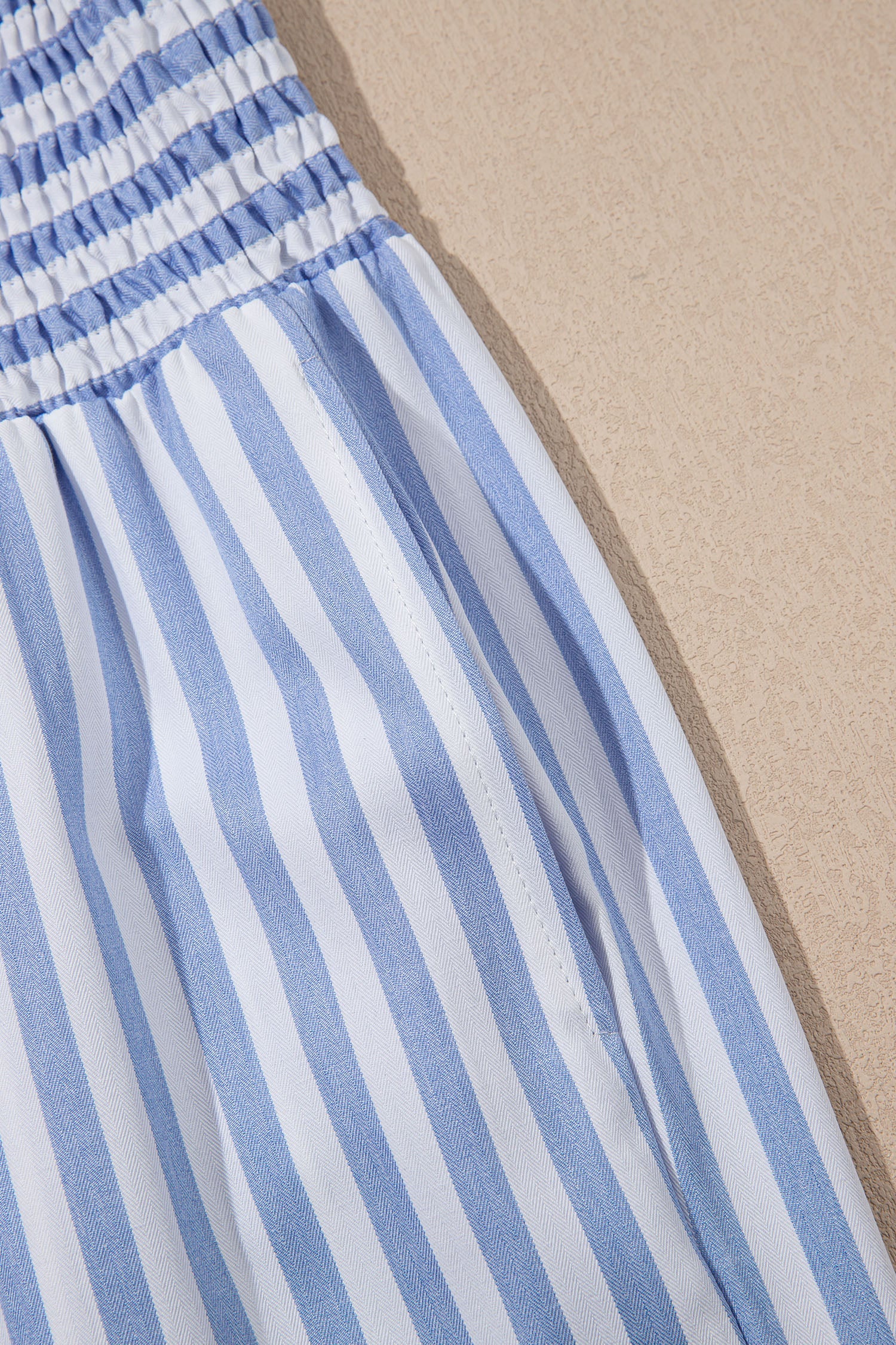 Light beige Brooke waist loose summer pants by Threaded Pear, featuring a relaxed fit and wide-leg design for casual comfort.