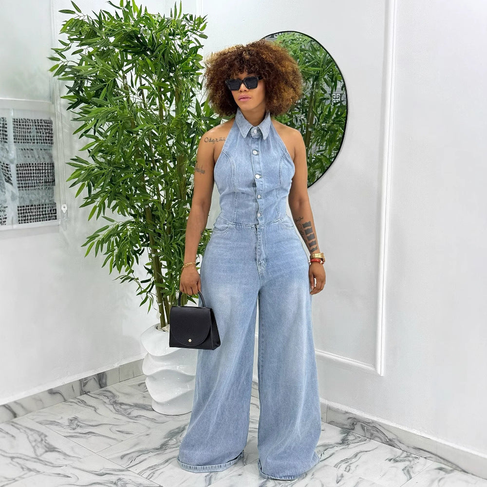 Women's backless washed denim halter jumpsuit by Plush Fashion Hub, showcasing a stylish sleeveless design and relaxed fit.