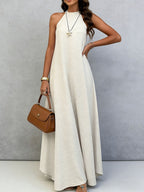 Women's ice silk crinkle sleeveless swing maxi dress by FitiqueFit, featuring a casual, flowing design perfect for warm weather.