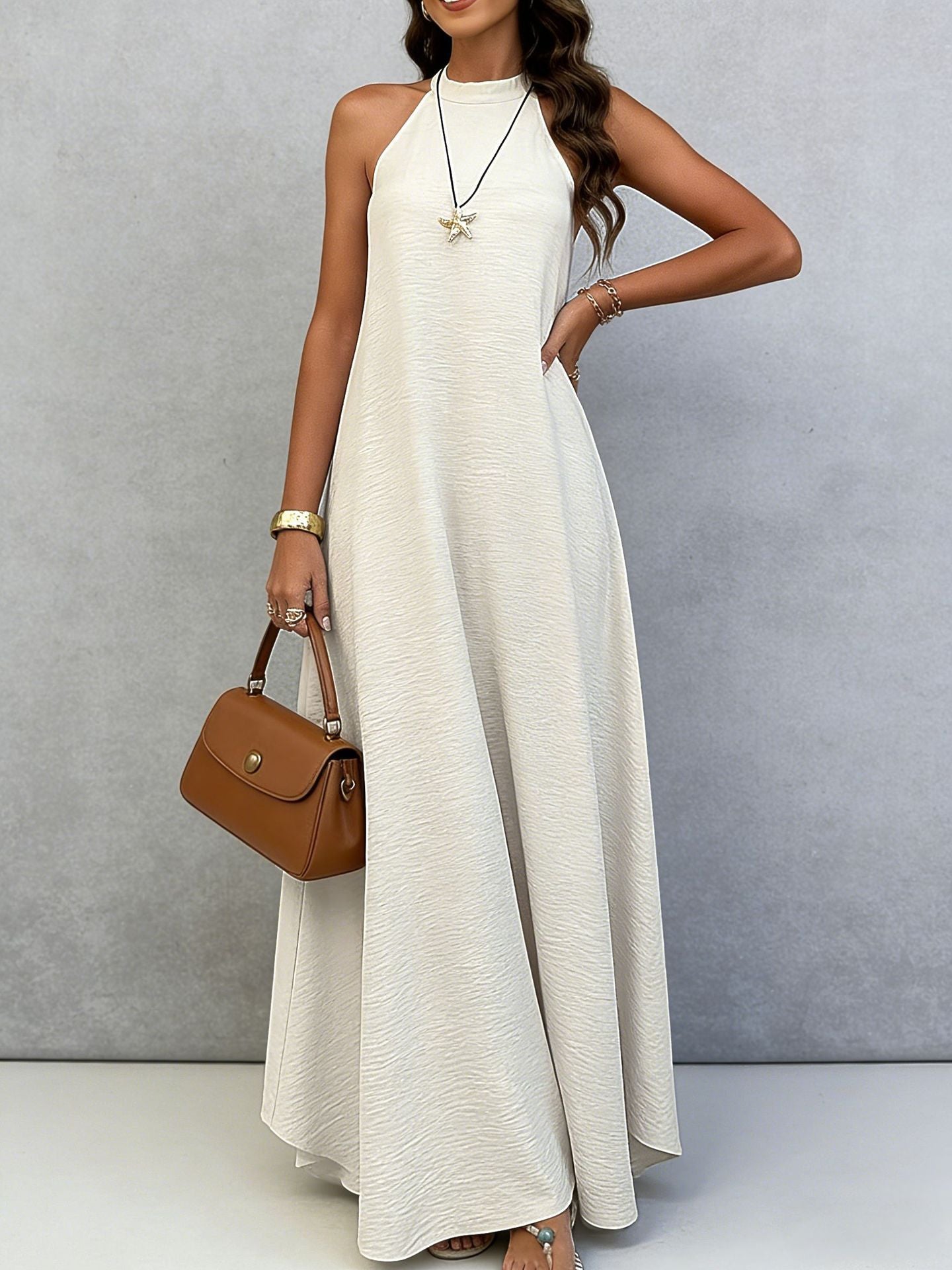 Women's ice silk crinkle sleeveless swing maxi dress by FitiqueFit, featuring a casual, flowing design perfect for warm weather.