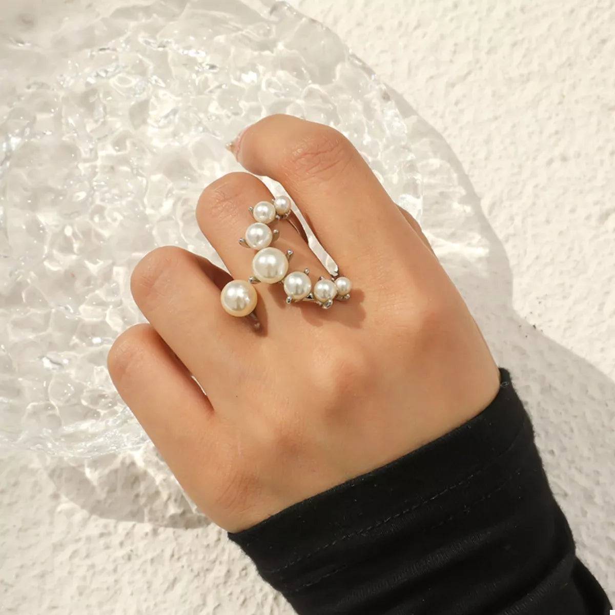 Plush Fashion Hub alloy pearl open ring showcasing a sleek design with pearl accents and a shiny metallic finish.