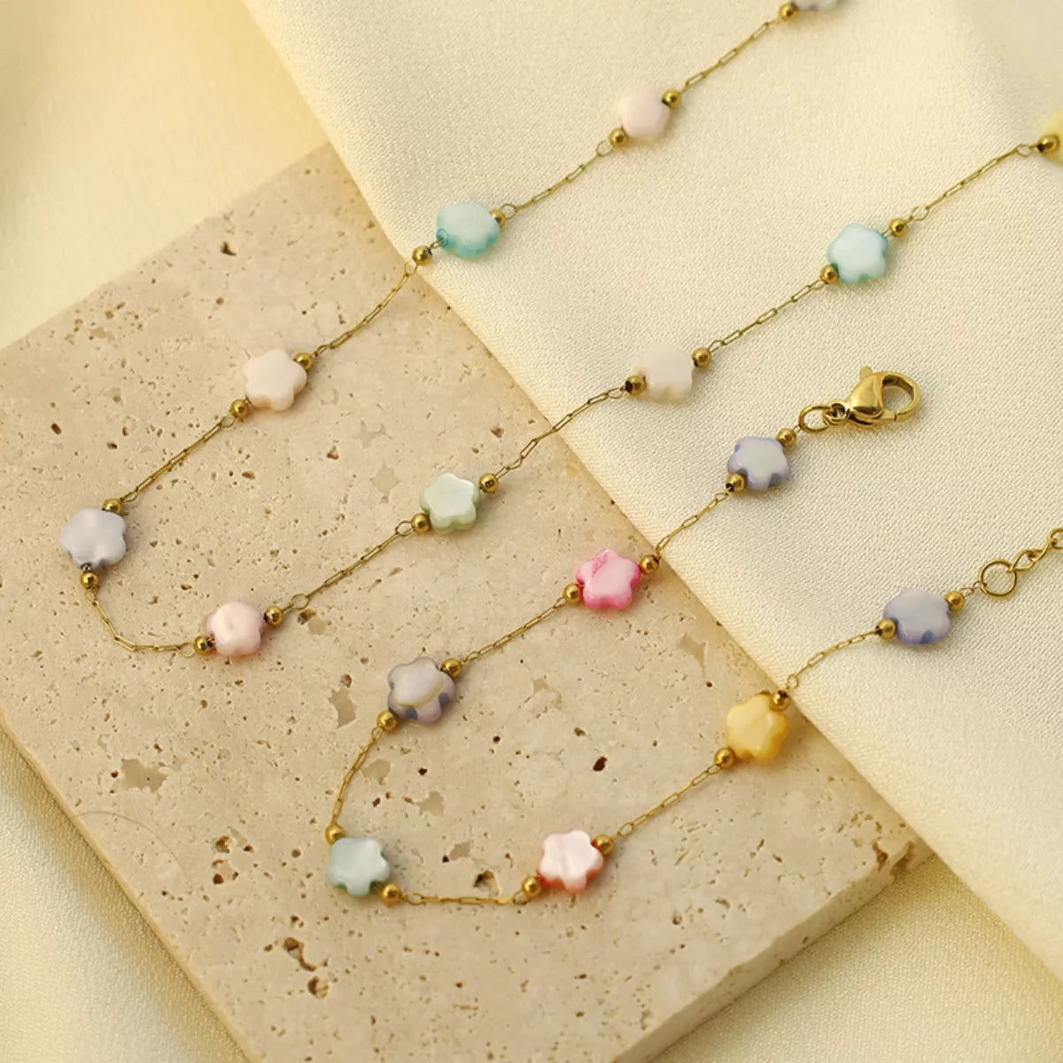 Gold-plated star charm necklace from Plush Fashion Hub featuring a delicate chain and shimmering star pendant.