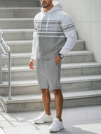 Men's casual striped hoodie and shorts set in plus size from Trendsi, featuring comfortable, relaxed-fit bottoms and a stylish striped design.