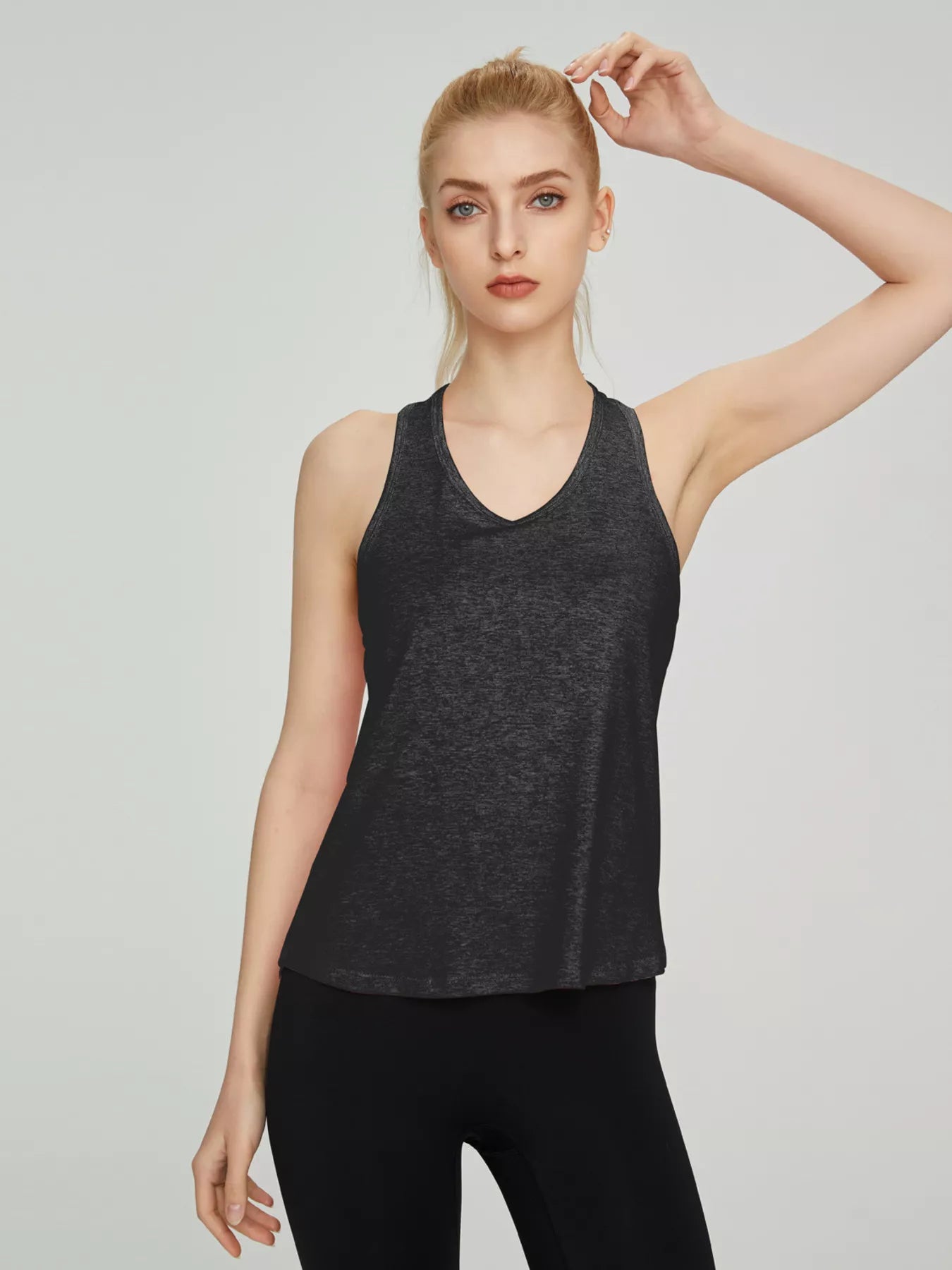Plush Fashion Hub breathable quick-drying active tank top showing lightweight fabric and sleeveless design for workout comfort.