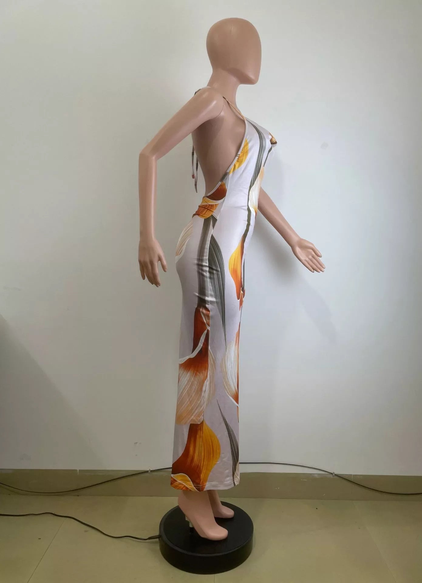 Floral print cowl neck backless maxi dress by Shopimist, flowing fabric with vibrant floral patterns and elegant backless design.