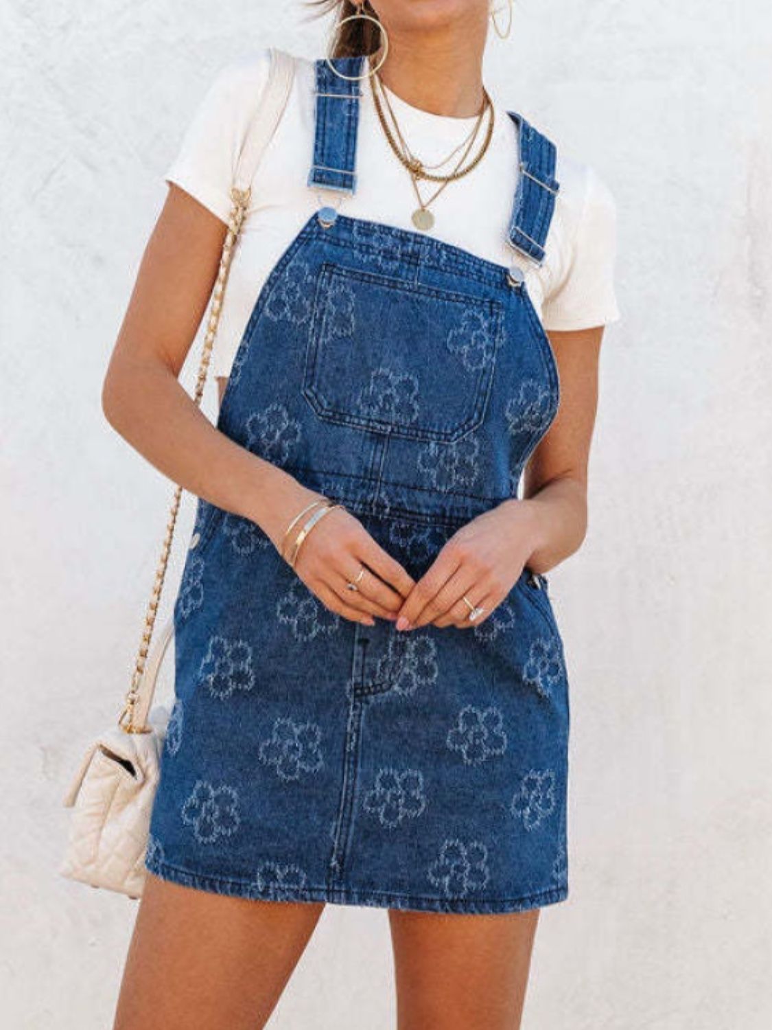 Flower wide strap denim overall dress with pockets, stylish fashion piece from Plush Fashion Hub, casual and comfortable clothing.