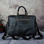 First layer cowhide men's 16-inch large-capacity briefcase from Plush Fashion Hub, with multiple compartments and sturdy leather handle.