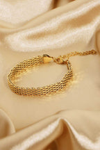18K gold-plated wide chain bracelet with bold links, stylish jewelry accessory, shown on a neutral background.