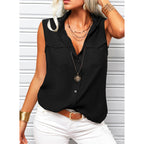 Women’s sleeveless top with lapel collar, loose fit, and pockets in a solid color from Plush Fashion Hub.