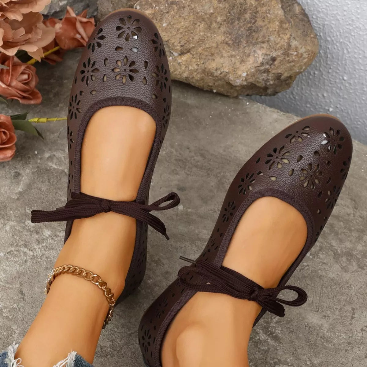 Floral cutout tied slip-on sandals by Plush Fashion Hub featuring open toes and floral details for a stylish summer look.