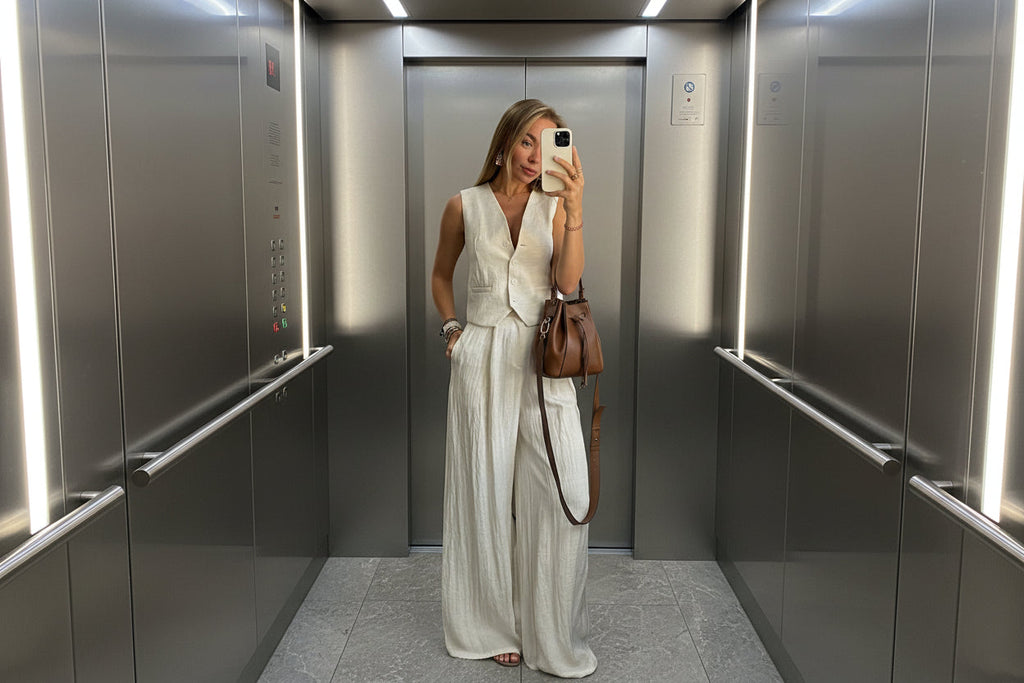 Women’s casual vest top and high waist wide-leg pants two-piece set by FitiqueFit, featuring a stylish, relaxed fit for everyday wear.