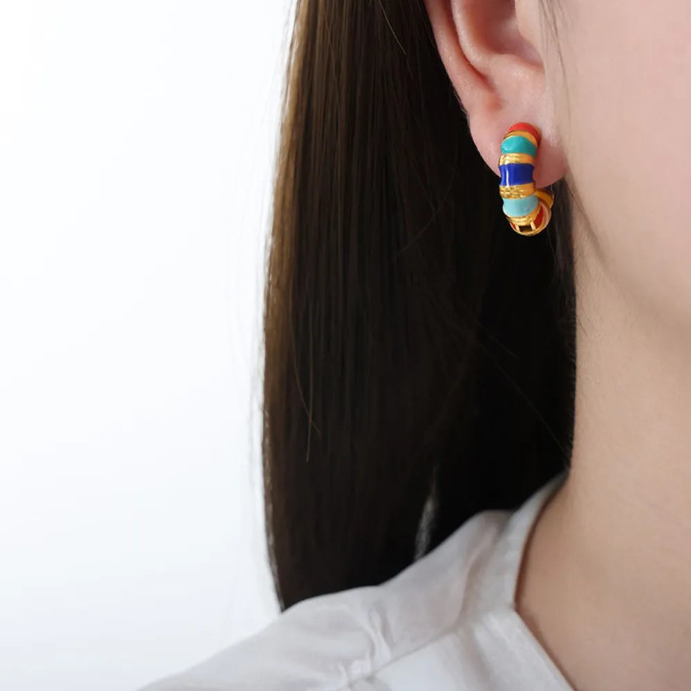 Titanium steel enamel hoop earrings with colorful design, stylish jewelry piece from Plush Fashion Hub for fashion accessories.
