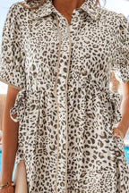 Women's leopard print button-down midi dress by Trendsi featuring a casual chic style in a viscose blend fabric.