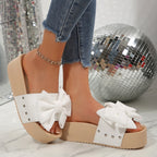 Women's chic bow decor platform sandals by Trendsi, featuring comfortable flat walking shoes with stylish bow detail and open toe design.