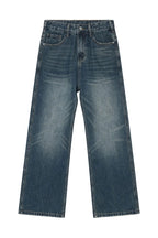 Plush Fashion Shop denim bootcut jeans with front and back pockets, classic five-pocket design, and a relaxed fit.