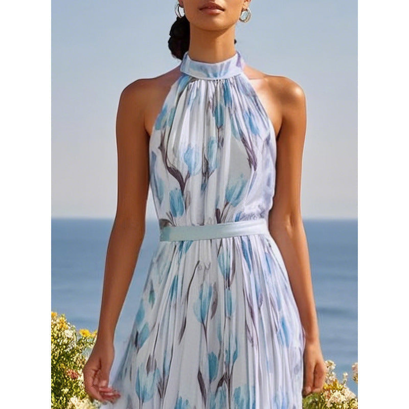 Women's halterneck high-waist swing dress by FitiqueFit featuring floral and solid print casualwear, flowing fabric and stylish design.