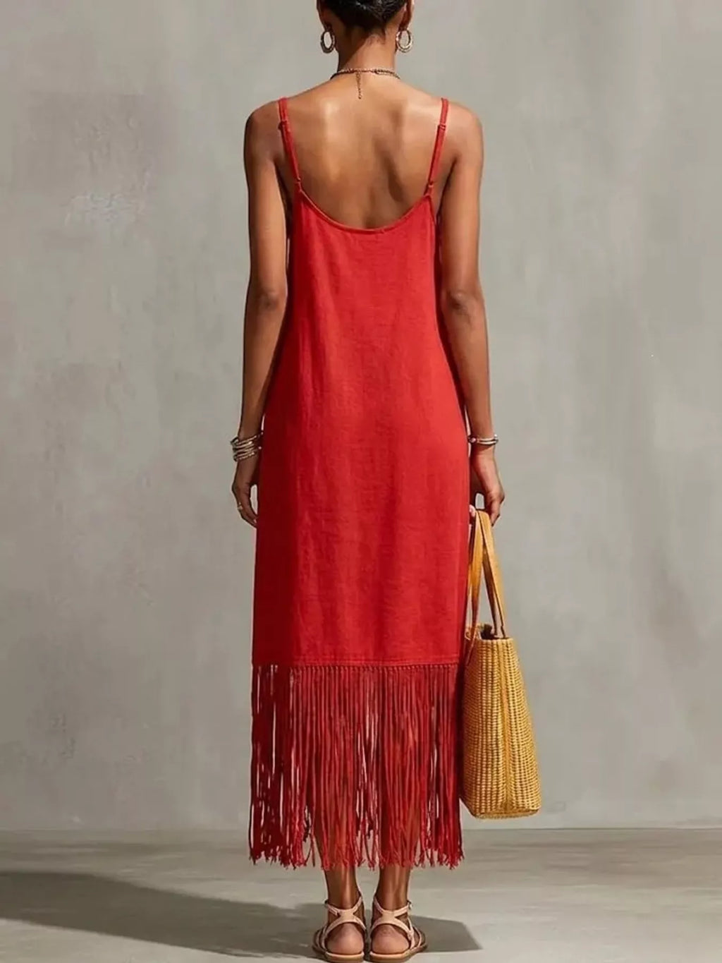 Plus size fringe v-neck spaghetti strap dress by Shopimist, featuring a full-length design with flowing fringe details.