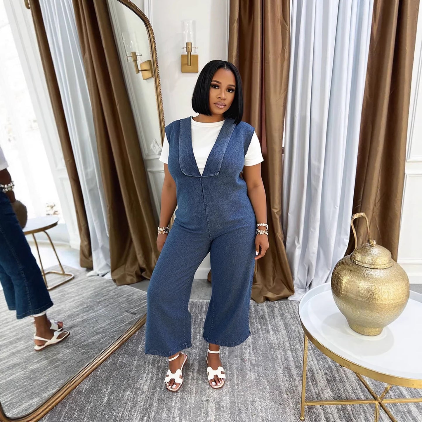 Washed denim V-neck casual jumpsuit with side pockets, from Plush Fashion Hub, stylish playsuit for relaxed everyday wear.