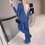 Ladies' slim fit V-neck long sleeve casual jumpsuit by FitiqueFit, showcasing a stylish, form-fitting design in a natural pose.