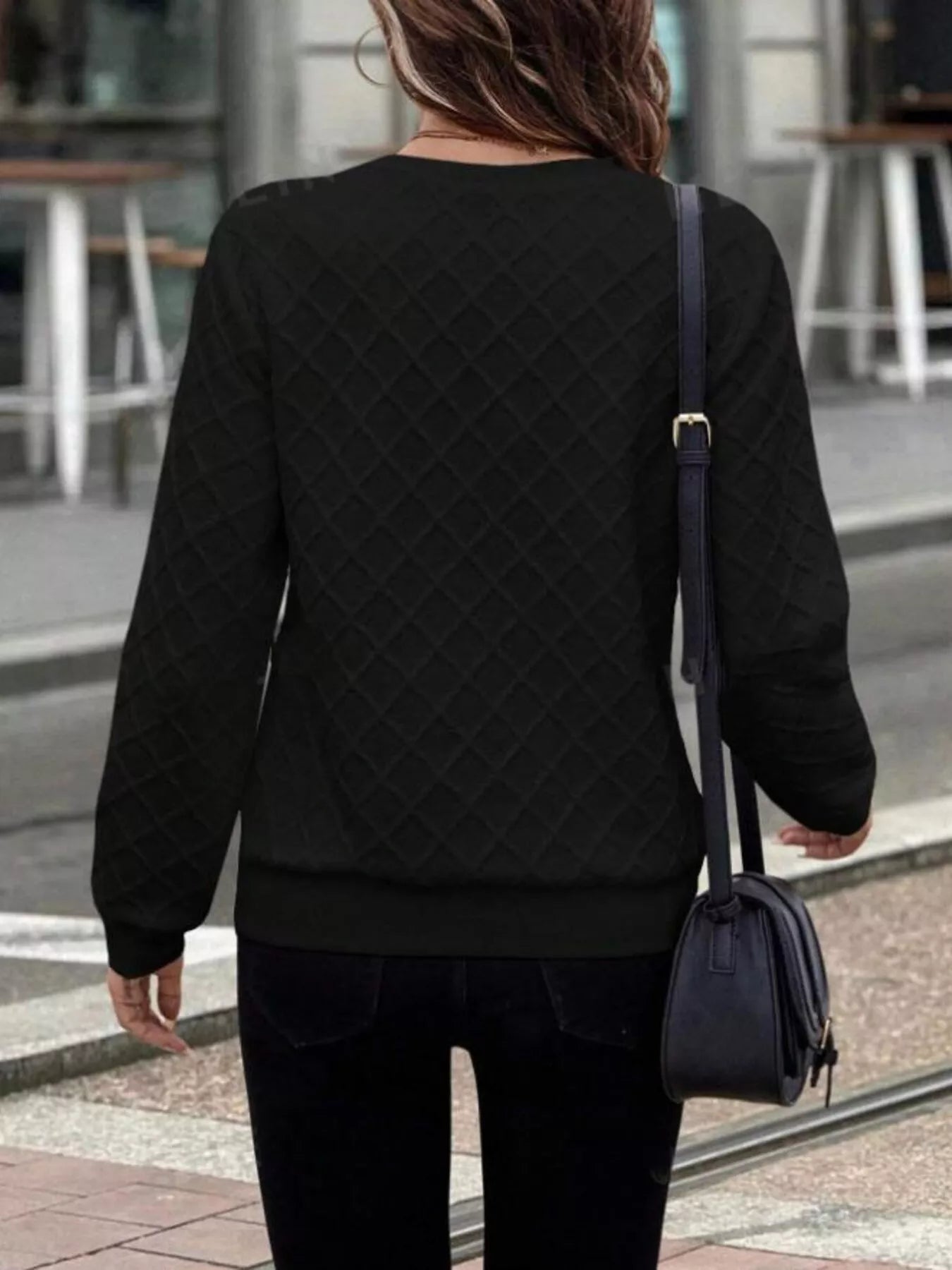 Textured quarter-zip sweatshirt from Trendsi featuring a comfortable fit and stylish design, shown on a neutral background.
