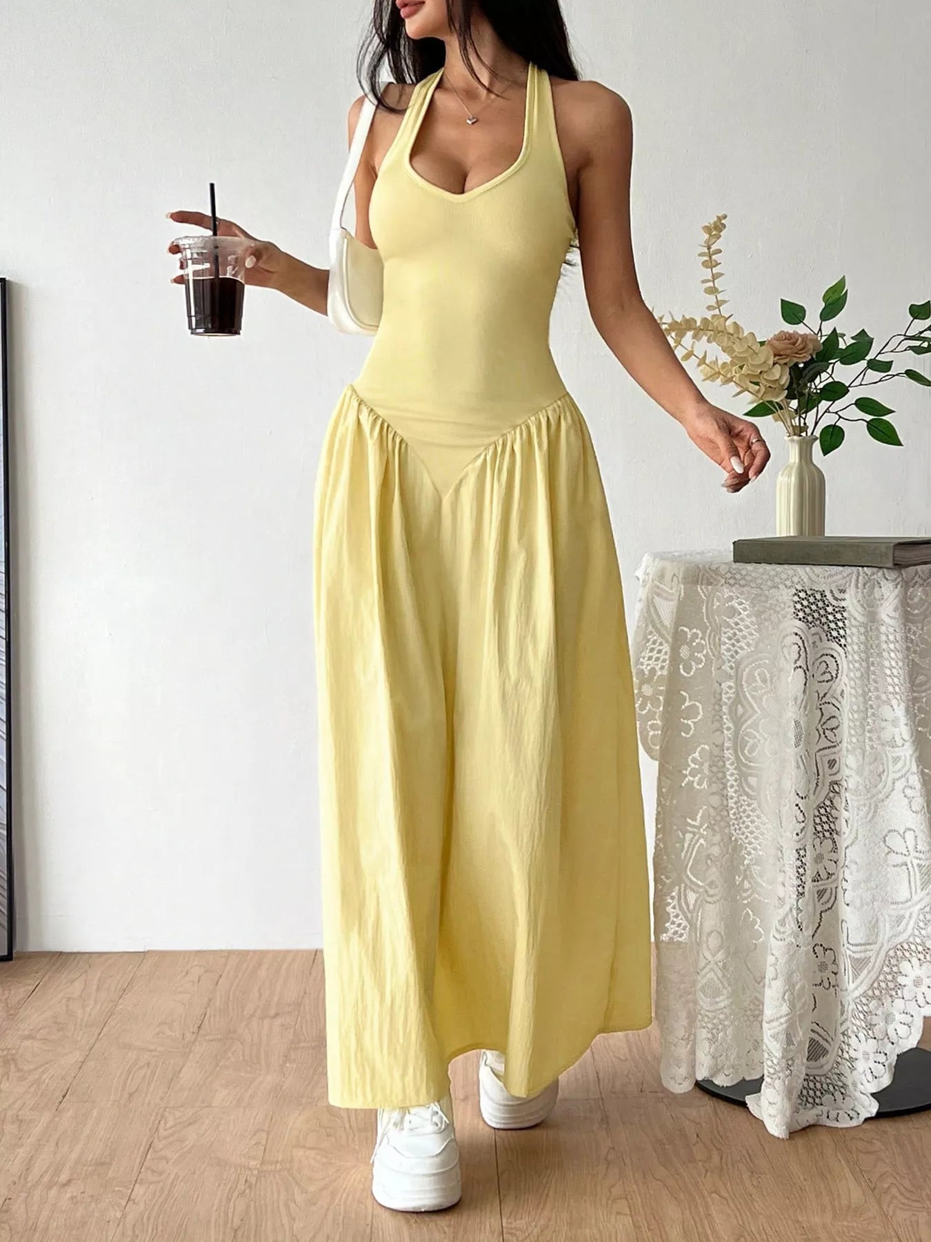 Halter neck ruched maxi dress by Shopimist featuring a flowing silhouette and gathered fabric for a stylish, elegant look.
