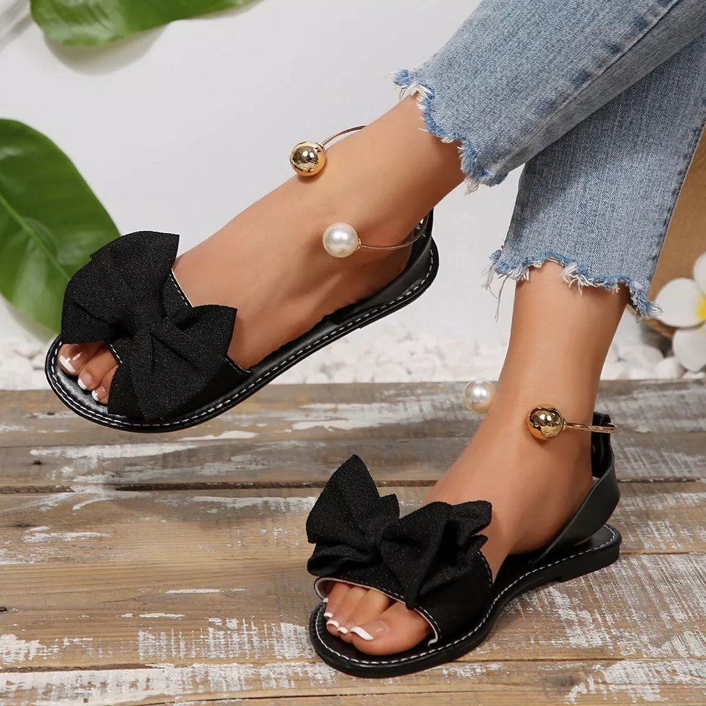 Shopimist bow open toe sandals featuring a stylish design with a bow detail and open toe style, perfect for warm weather.
