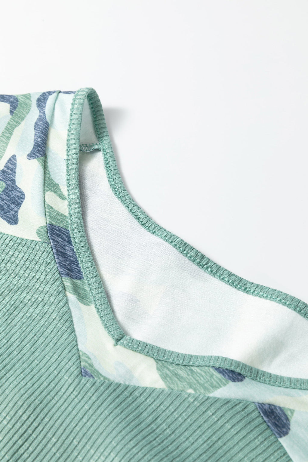Plus size Mazie Mist Ribbed Patchwork Tee by Threaded Pear, featuring a ribbed fabric and colorful patchwork design.