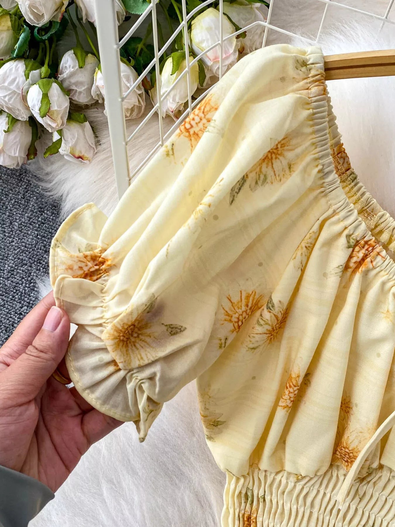 Shopimist smocked floral top and skirt set featuring a lightweight, feminine design with vibrant flower patterns and ruffled details.