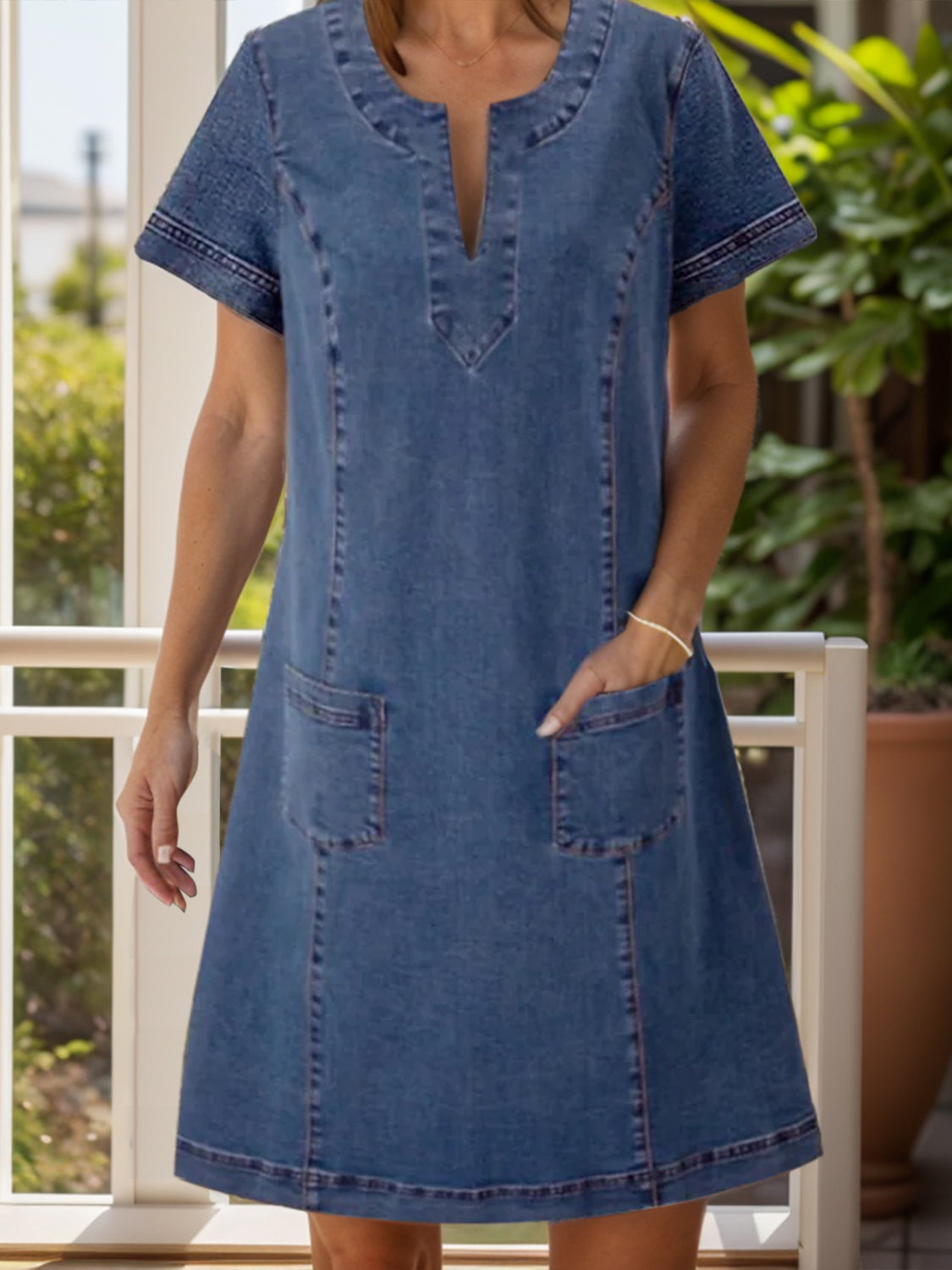 Full size notched short sleeve denim dress by Plush Fashion Hub, showcasing classic blue denim with stylish notched neckline.
