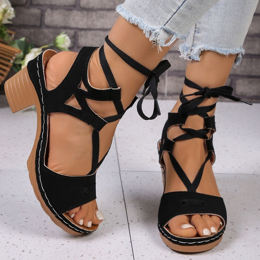 Women's lace-up block heel sandals with strappy design and mid-height heel, stylish shoes from Trendsi.