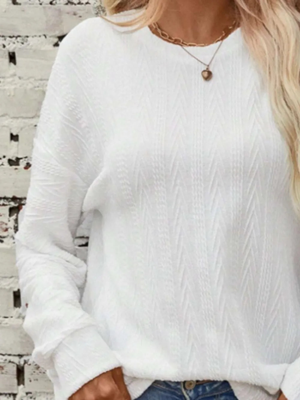 Textured round neck long sleeve T-shirt from Plush Fashion Hub, showcasing a comfortable, stylish top with a textured fabric design.