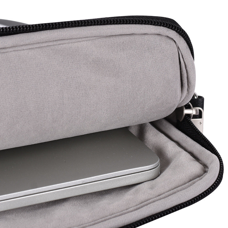 Plush Fashion Hub laptop bag and briefcase with protective sleeve, featuring a sleek, stylish design for secure laptop storage.
