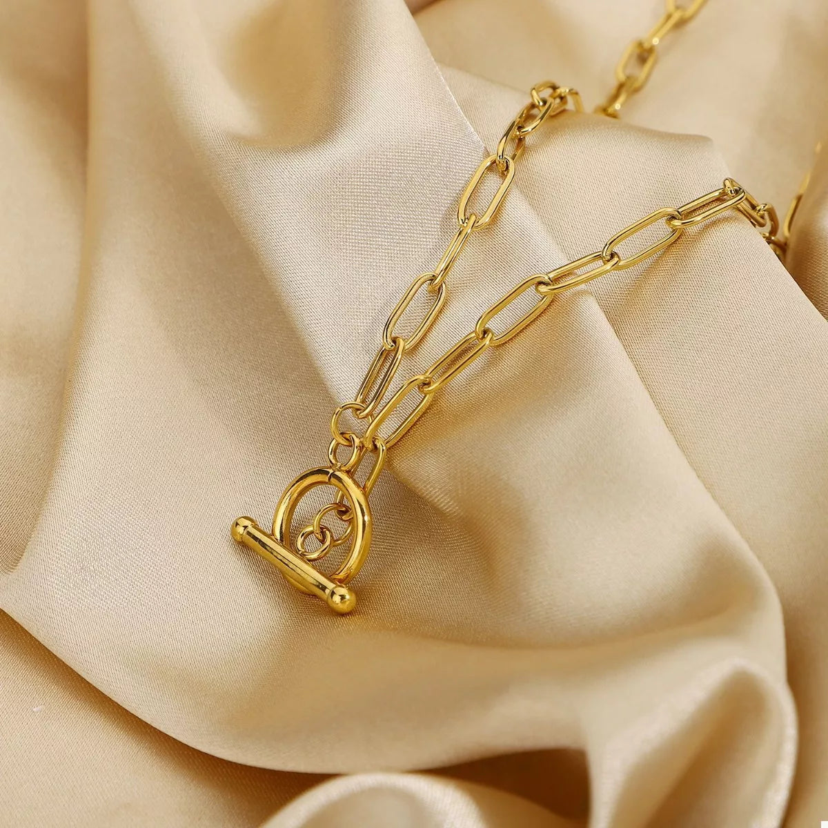 18K gold-plated chain link toggle clasp necklace with a stylish design, showcasing a shiny gold finish and secure toggle closure.