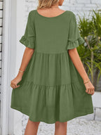 Lightweight rayon mini dress with ruffled sleeves, tiered design, and pockets, perfect for casual summer wear.