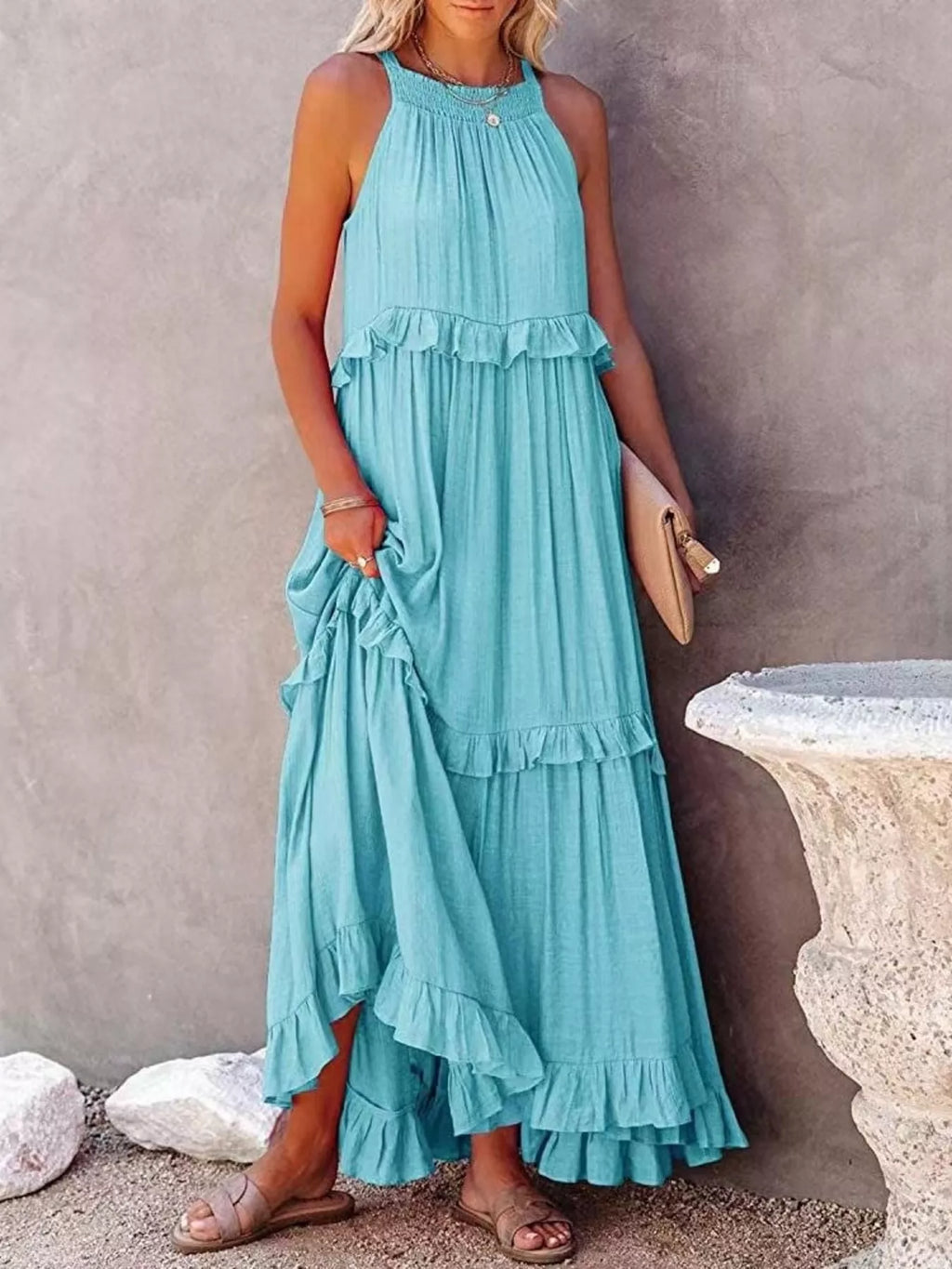 Ruffled tiered sleeveless maxi dress in flowing fabric, stylish design by Plush Fashion Hub, perfect for summer occasions