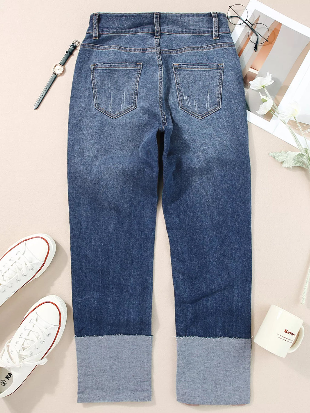 High waist distressed straight leg jeans by Trendsi, showing fit and rips, styled on a model with casual footwear.