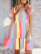 Women's ruffled color block V-neck dress by Trendsi featuring casual cotton blend fabric and a midi length with ruffle details.