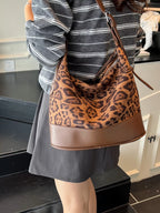 Adjustable strap tote bag by Shopimist with spacious interior and sturdy handles, displayed with the bag's adjustable strap visible.