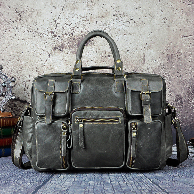 First Layer Cowhide Men's 16-inch large-capacity briefcase from Plush Fashion Hub, showing sturdy leather exterior and spacious design.