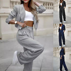 Women's striped spring fashion suit featuring a cropped long sleeve top and straight pants, with a casual lapel design.