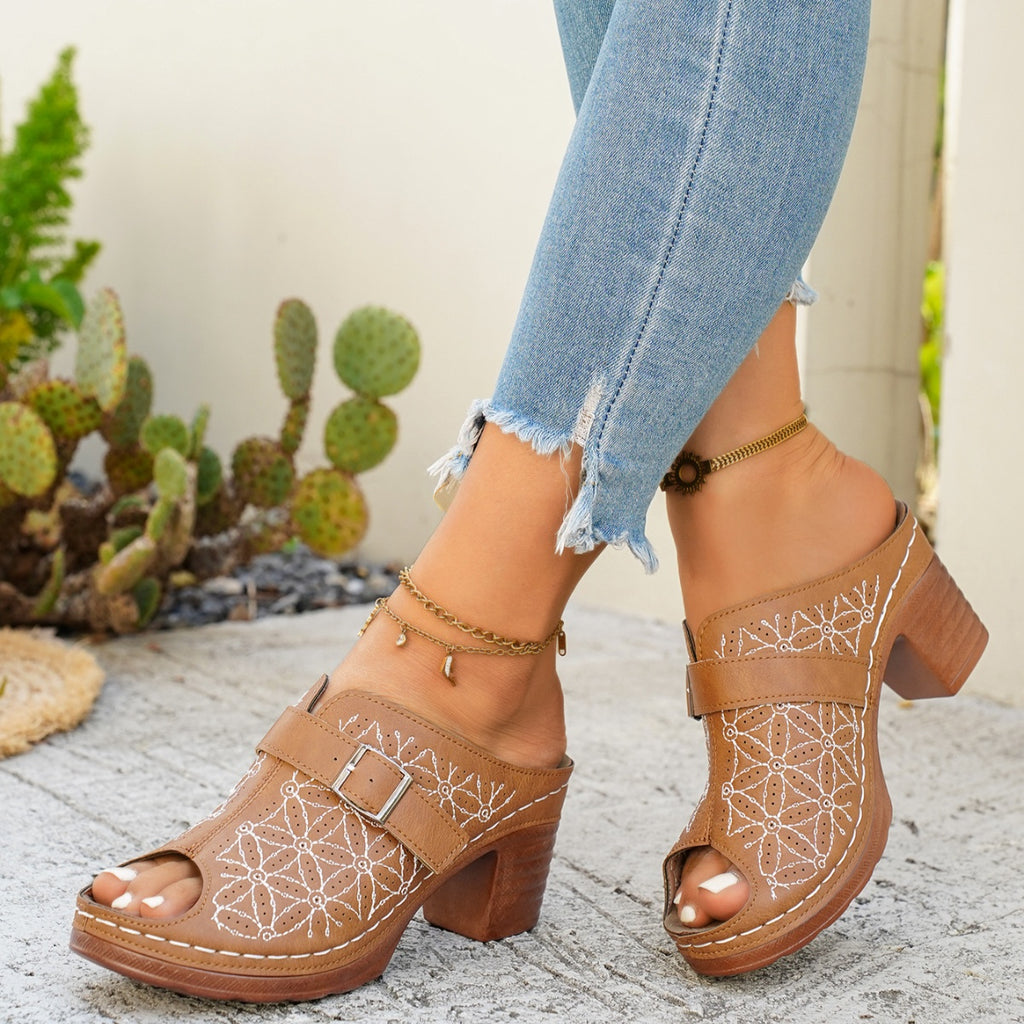 Women's chic buckle detail block heel sandals by Trendsi, featuring premium faux leather straps and stylish design.