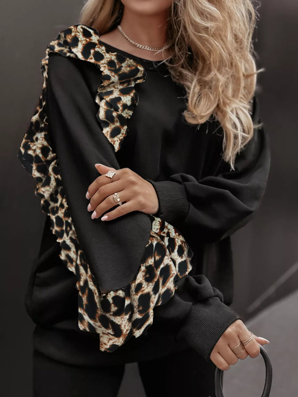 Simply Love leopard trim top and pants set featuring a stylish animal print, perfect for casual or trendy outfits.